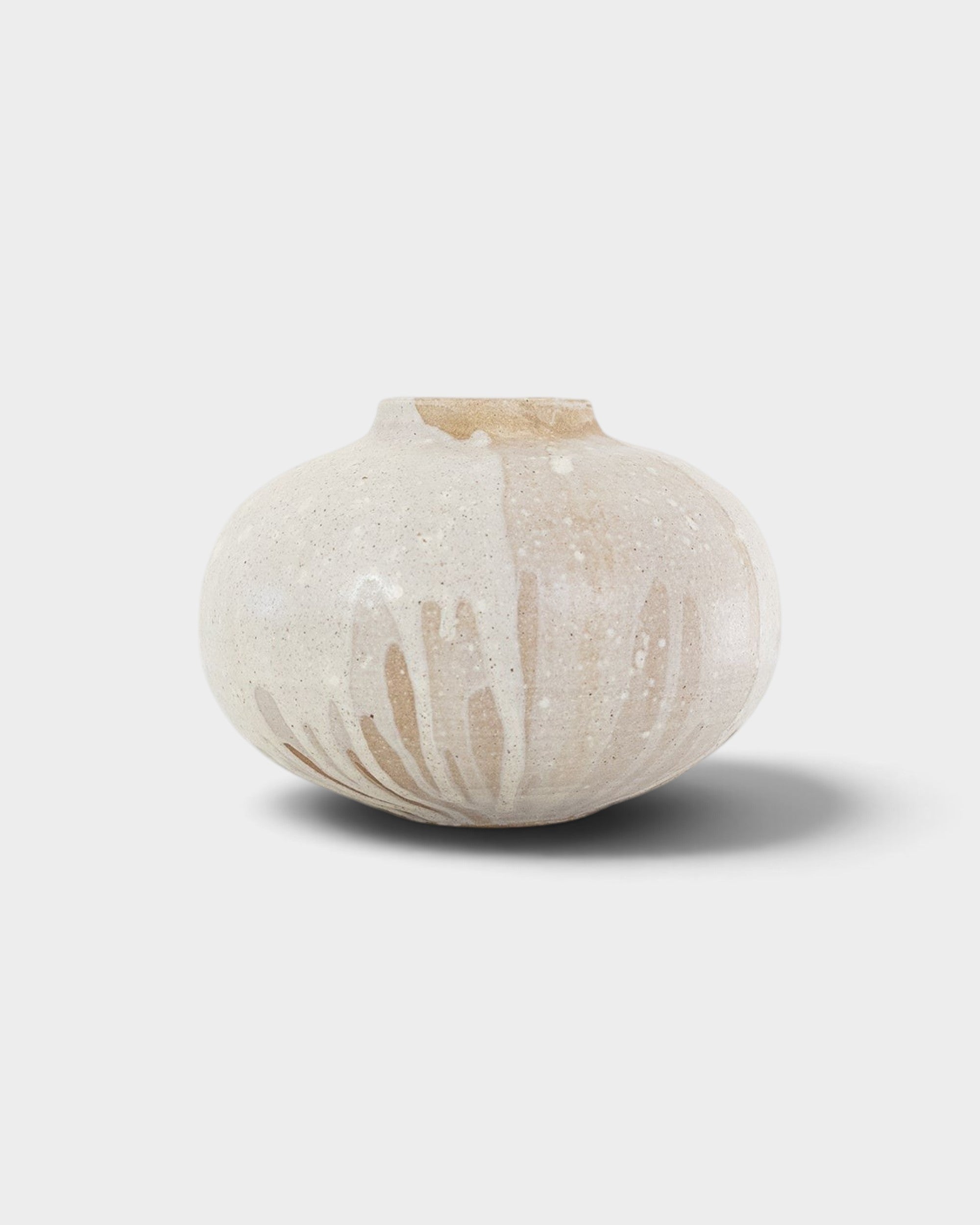 JONES + CO handthrown ceramic vase with a speckled cream glaze and organic sculptural shape