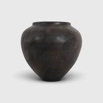 JONES + CO handthrown ceramic Vase No. 1 in a dark, mottled charcoal finish with a unique sculptural silhouette.