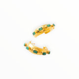 JONES + CO Havana Glow hoop earrings featuring raw Colombian emeralds set in 24K gold-plated brass.