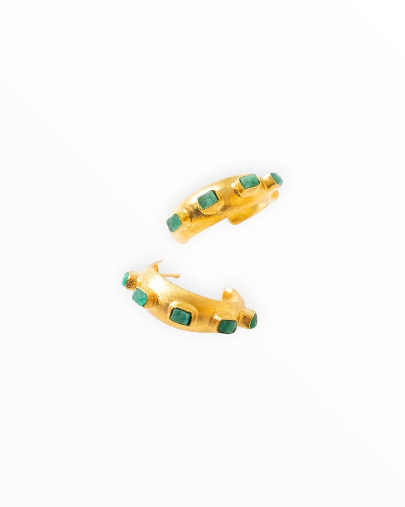 JONES + CO Havana Glow hoop earrings featuring raw Colombian emeralds set in 24K gold-plated brass.