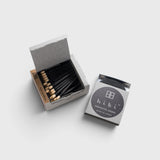 JONES + CO Hibi sandalwood incense matches in a grey box with black matchsticks, providing a 10-minute aroma.