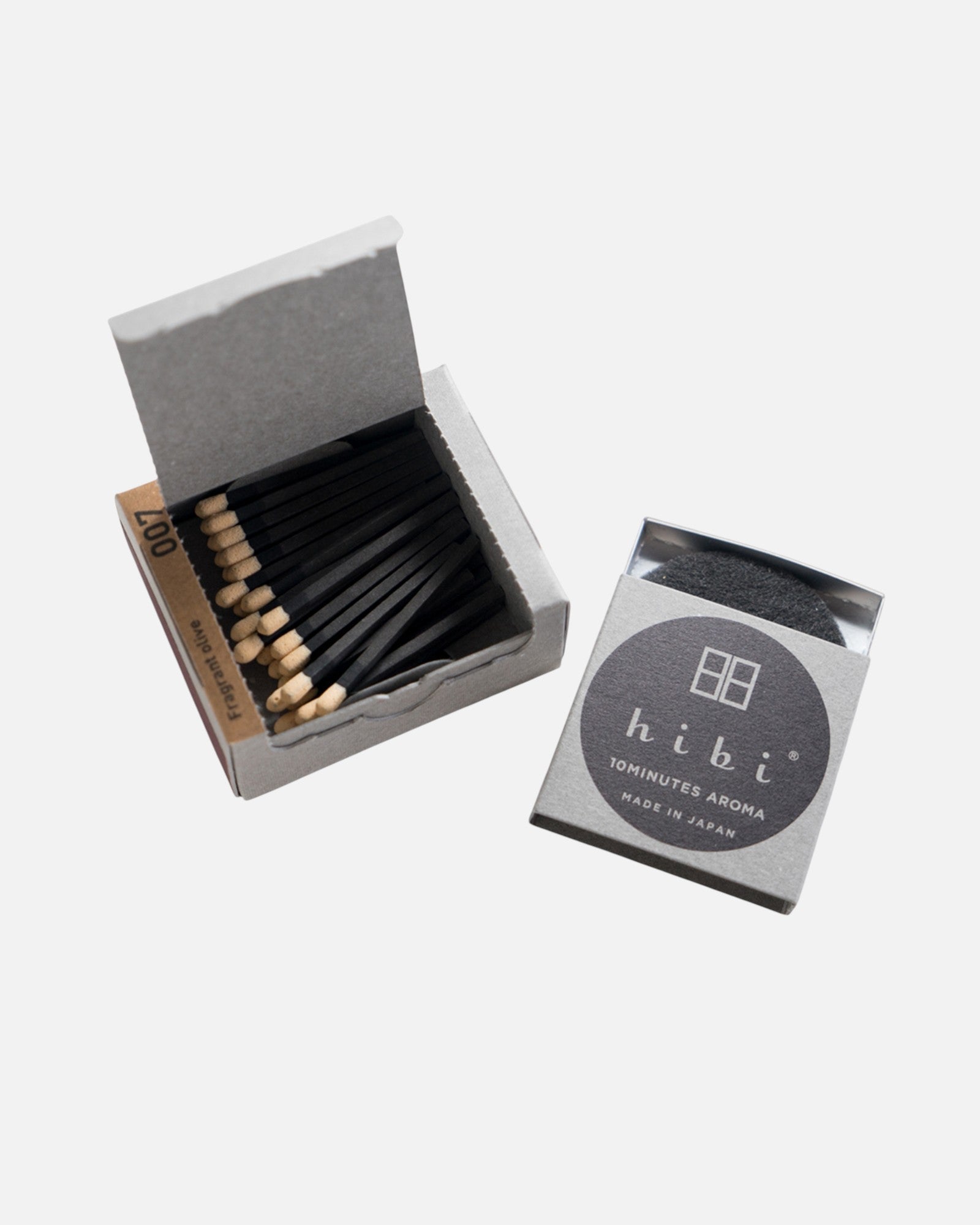 JONES + CO Hibi incense matches in sandalwood, featuring a grey box of 30 black sticks with light wooden tips.