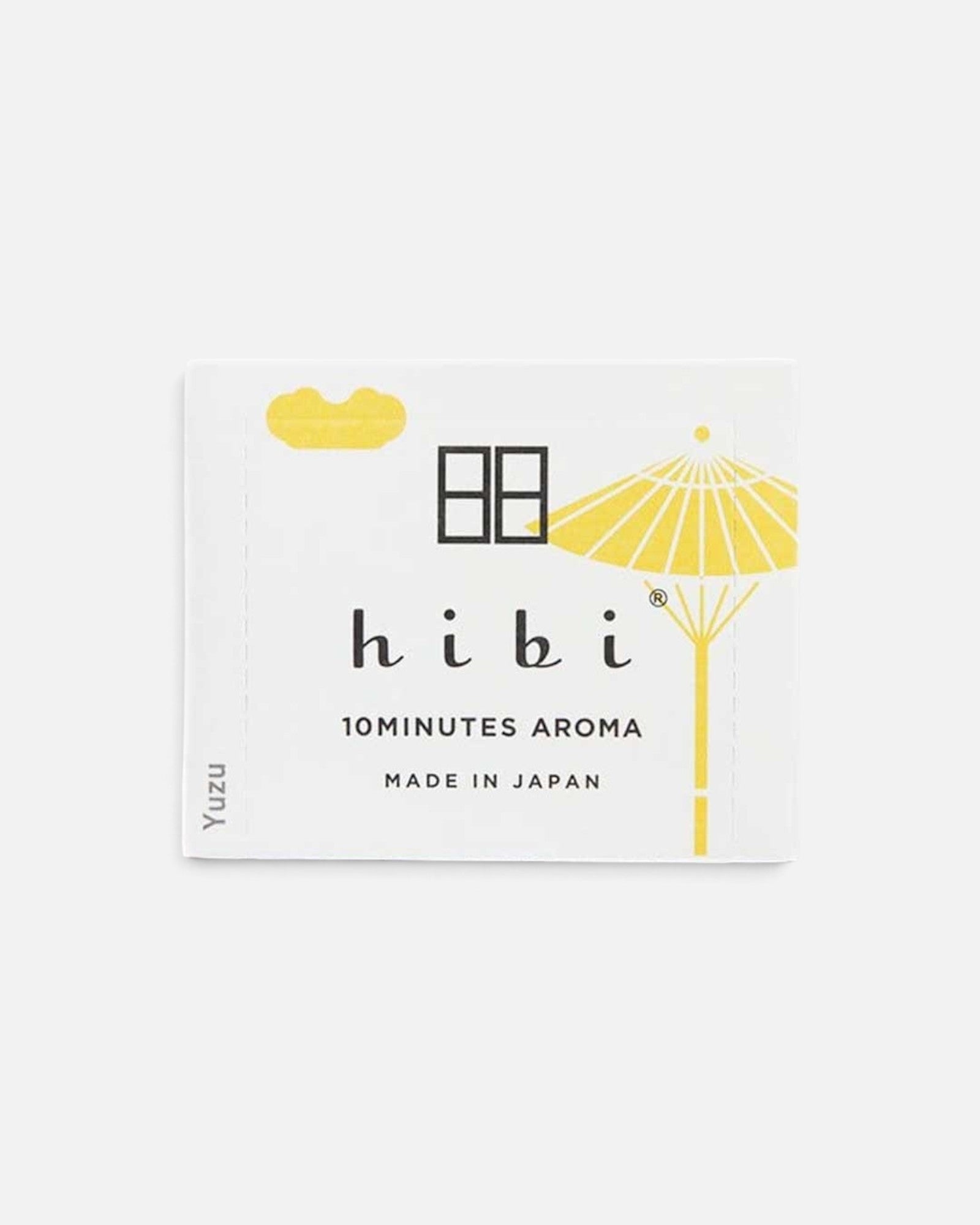 JONES + CO Hibi incense matches box in Yuzu scent featuring a yellow umbrella illustration on a white background.