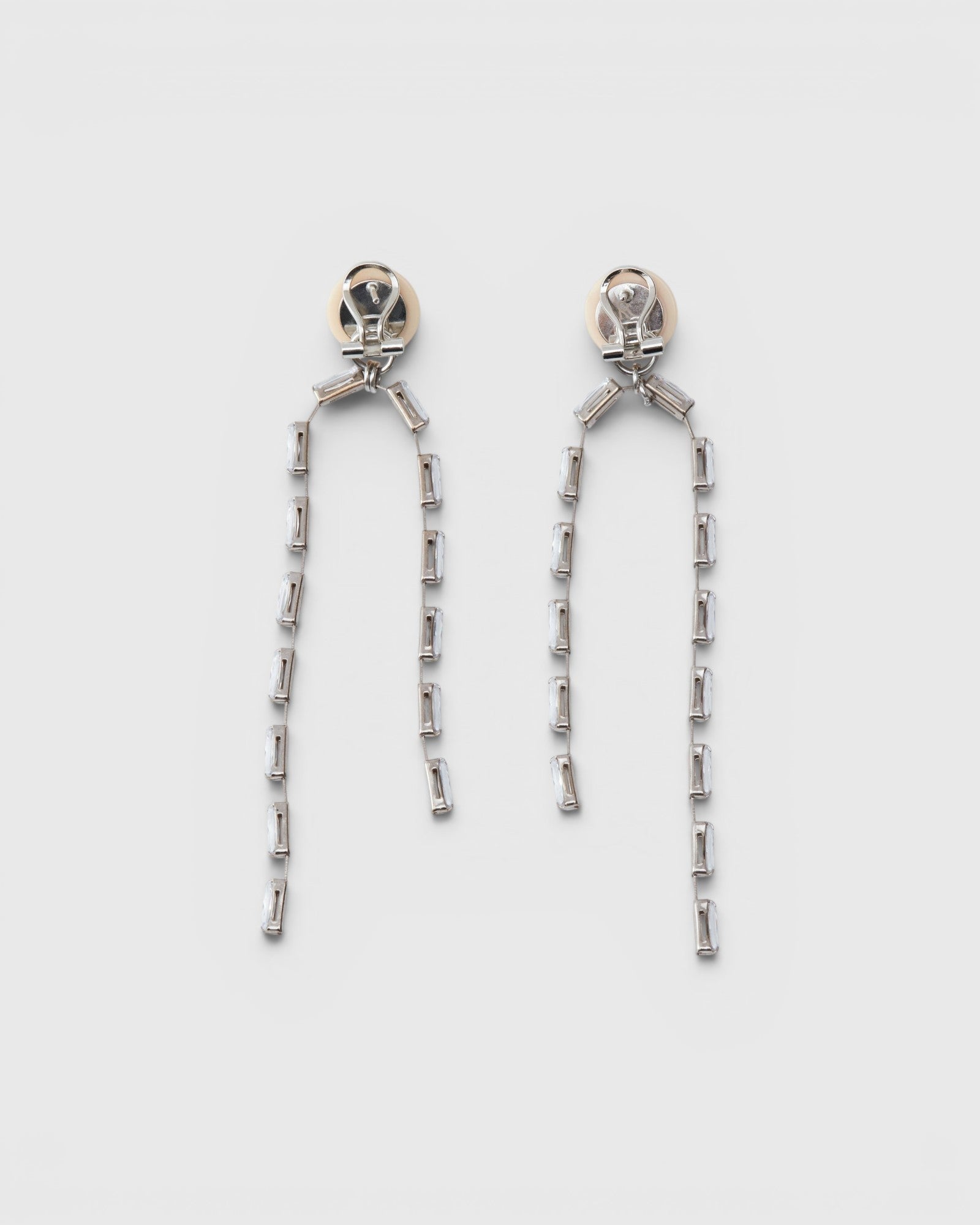 JONES + CO Rachel Comey ivory acrylic and brass baguette drop earrings with surgical steel posts.