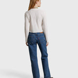 JONES + CO Jamie long-sleeve recycled cotton tee in whitecap grey, shown from the back on a model with blue jeans.