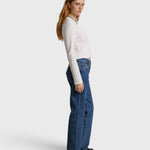 JONES + CO Jamie long sleeve tee in whitecap grey recycled cotton worn by a model with blue jeans and loafers