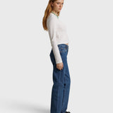 JONES + CO Jamie long sleeve tee in whitecap grey recycled cotton worn by a model with blue jeans and loafers
