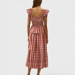 JONES + CO Janne top in terra rosso check print with square neckline, cap sleeves, and shirred waist, back view.