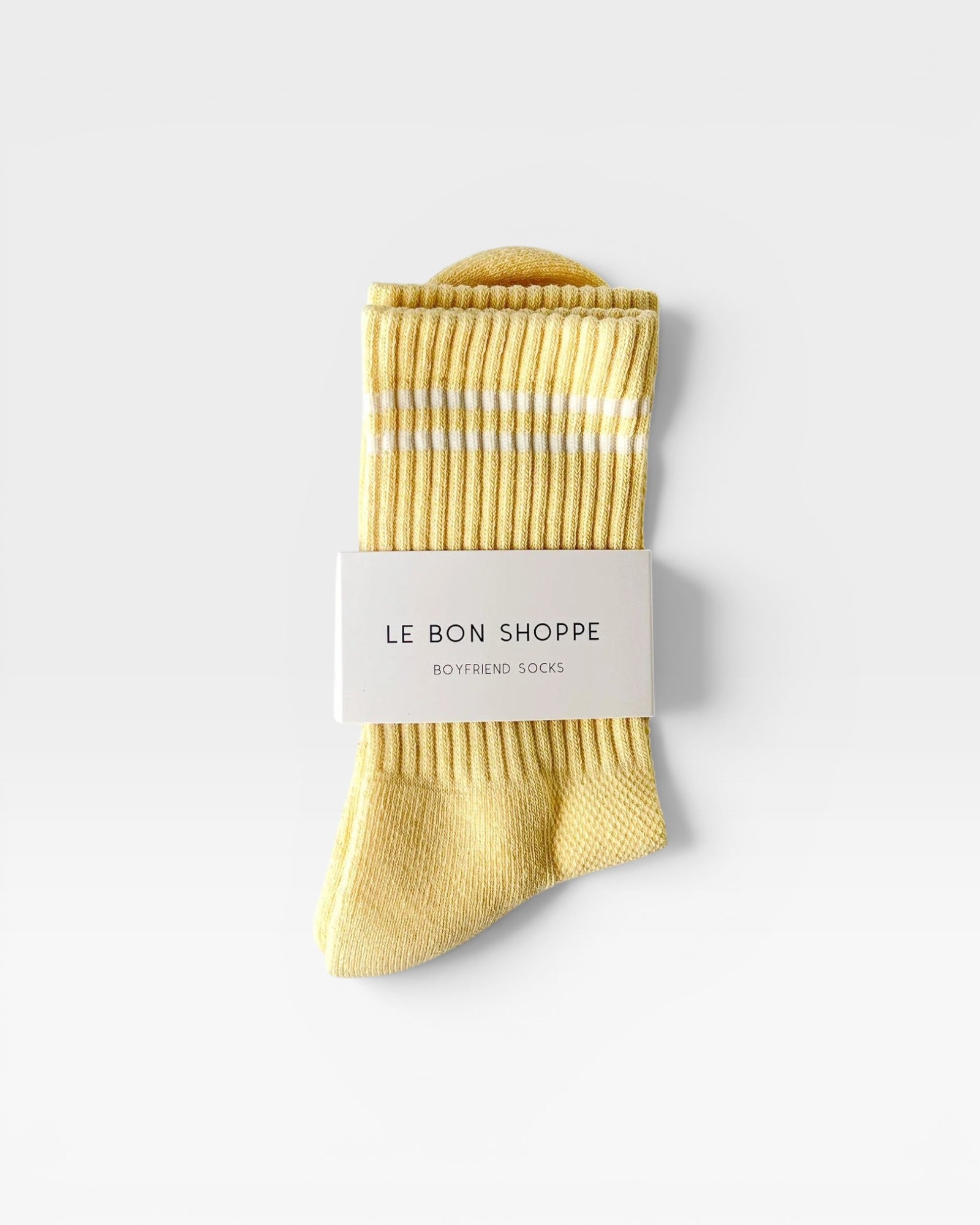 JONES + CO lemonade yellow Boyfriend Socks with white double stripes, ribbed texture, and breathable mesh detailing.