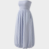 JONES + CO Lunaire midi dress in light blue striped cotton with a strapless shirred bodice and bubble hem skirt.