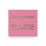 JONES + CO art book Lucas Samaras Flowers with a bright pink cover and green stylized typography.