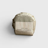 JONES + CO lülala lavender and pink grapefruit soap bar wrapped in sustainable brown paper packaging.
