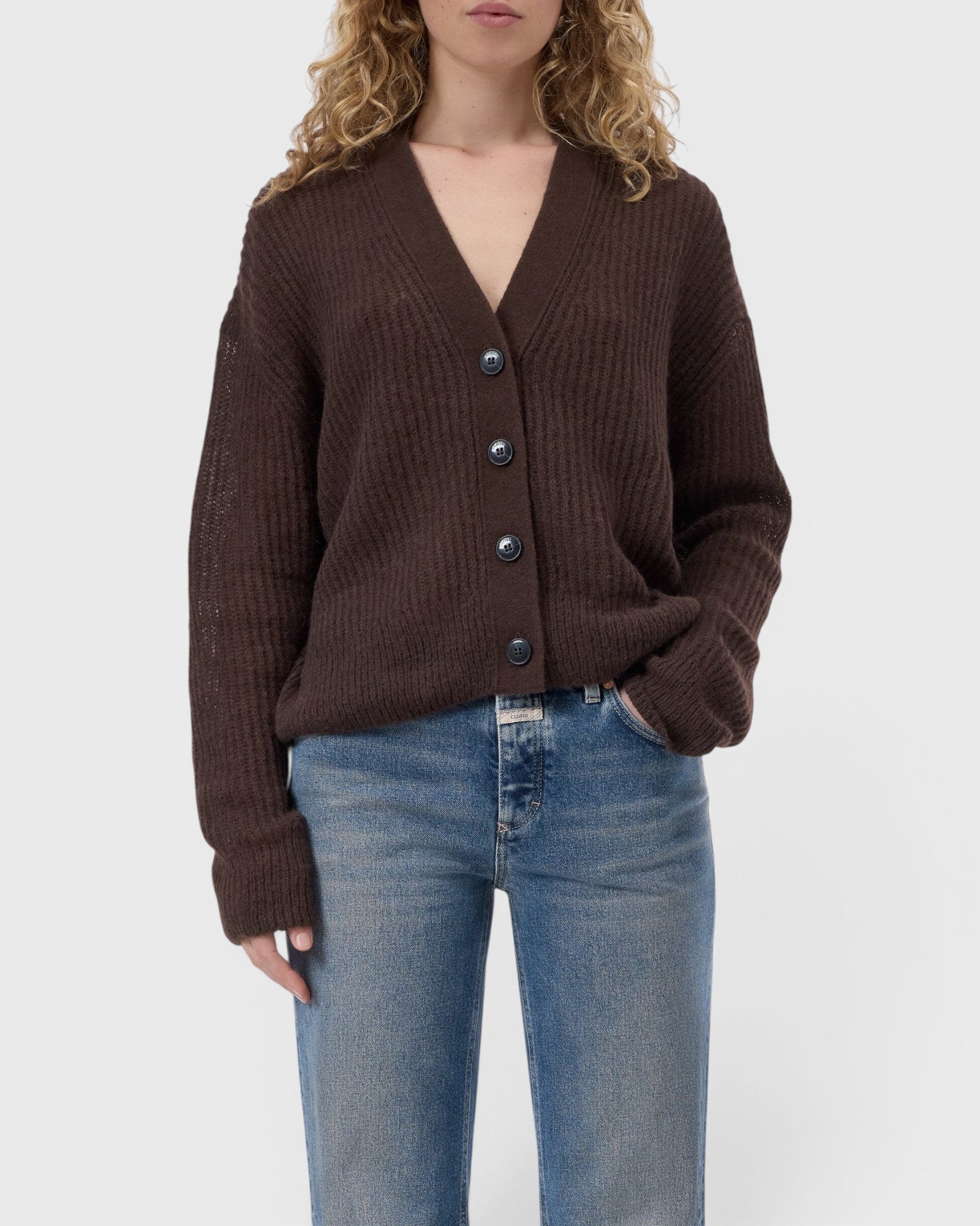 JONES + CO mahogany brown alpaca-blend V-neck cardigan with button front, ribbed cuffs, and hem on a model