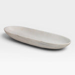 JONES + CO long oval bowl crafted from natural white marble with a smooth honed finish and unique grey veining.