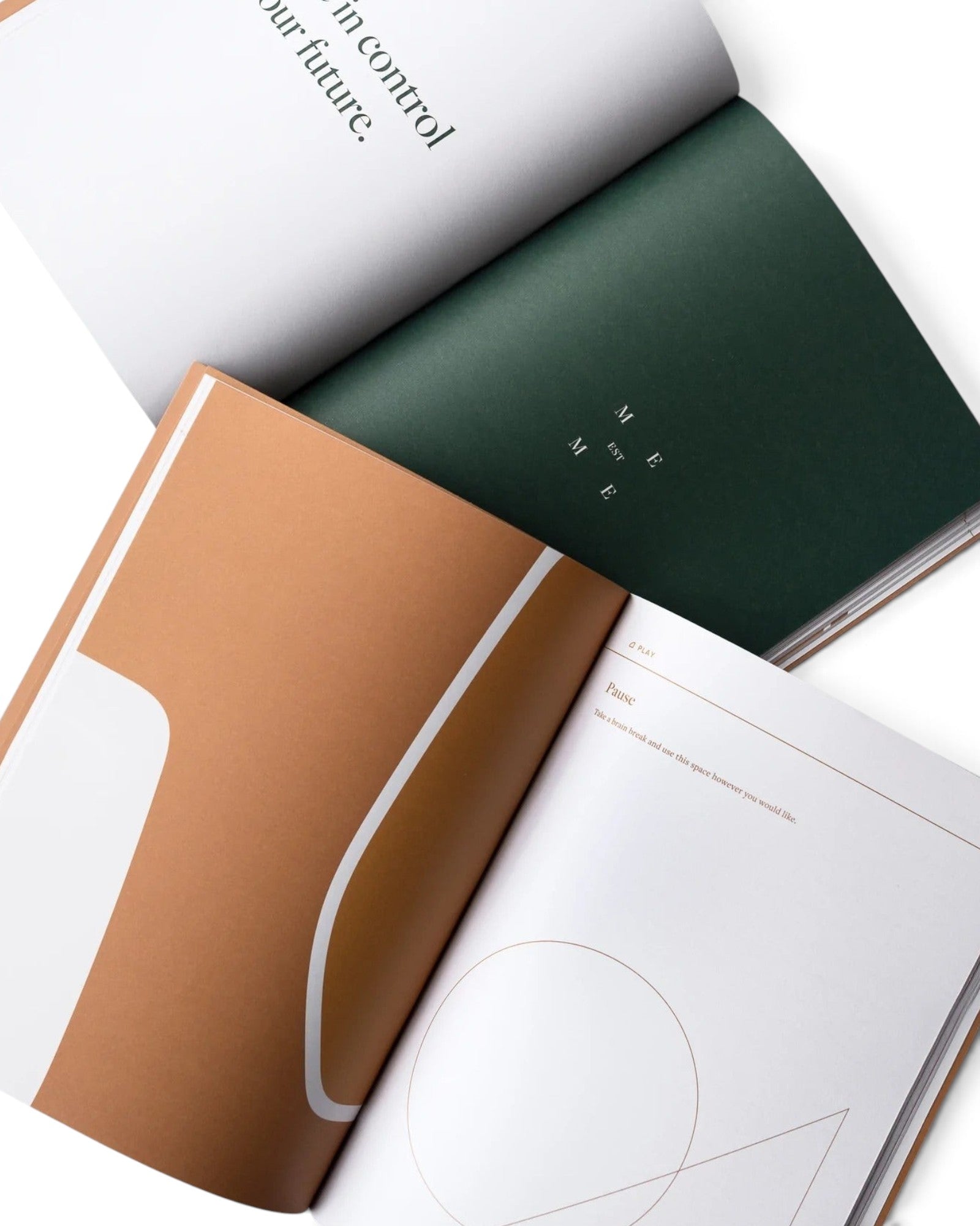 JONES + CO Me-est Me Journal open to pages with organic shapes, calming earth tones, and guided self-reflection prompts.