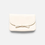 JONES + CO milk pebble grain leather petite case featuring a delicate knotted bow on the front flap