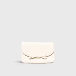 JONES + CO milk pebble grain leather petite case featuring a delicate knotted bow on the front flap