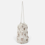 JONES + CO Mini Web Bag in silver featuring intricate macrame leather weaving and decorative bamboo beads.