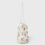JONES + CO Mini Web Bag in silver featuring intricate macrame leather weaving and decorative bamboo beads.