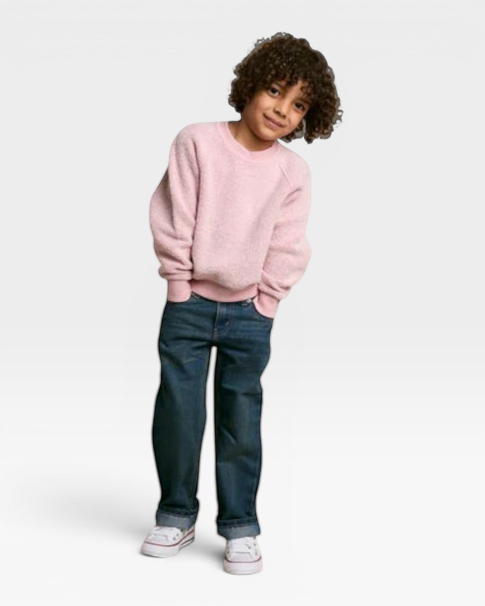 JONES + CO Mini Ziggy sweatshirt in vintage pink soft cotton fleece worn by a child with dark curly hair.