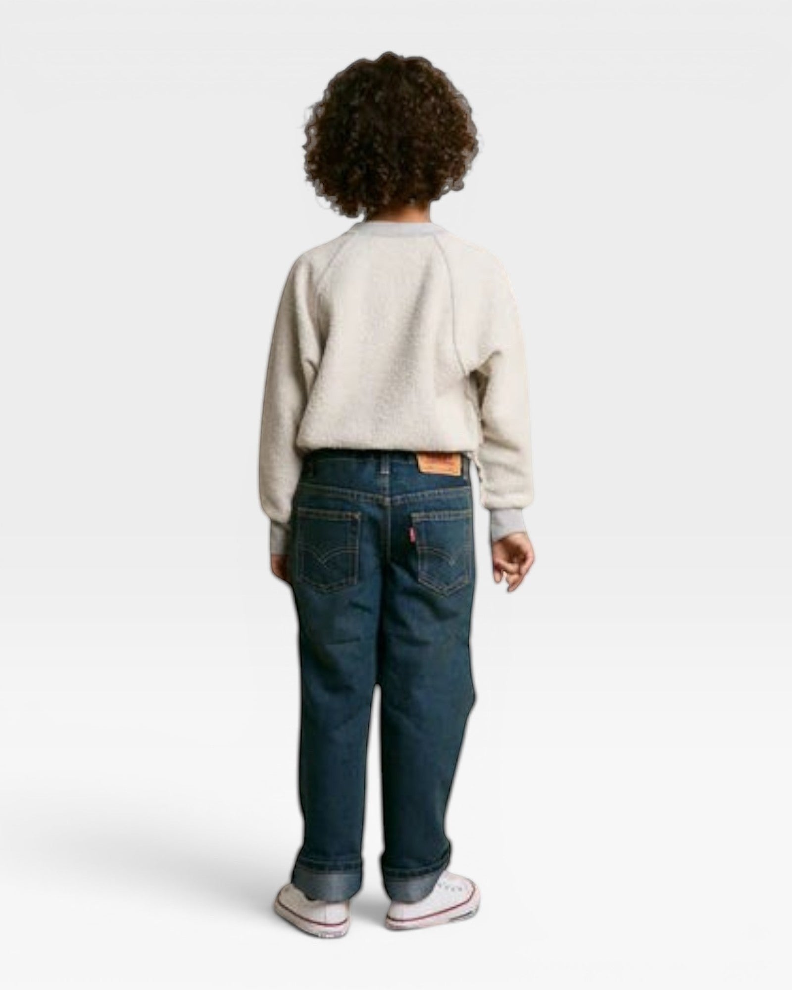 JONES + CO Mini Ziggy sweatshirt in heather grey soft cotton fleece worn by a child with blue jeans from behind