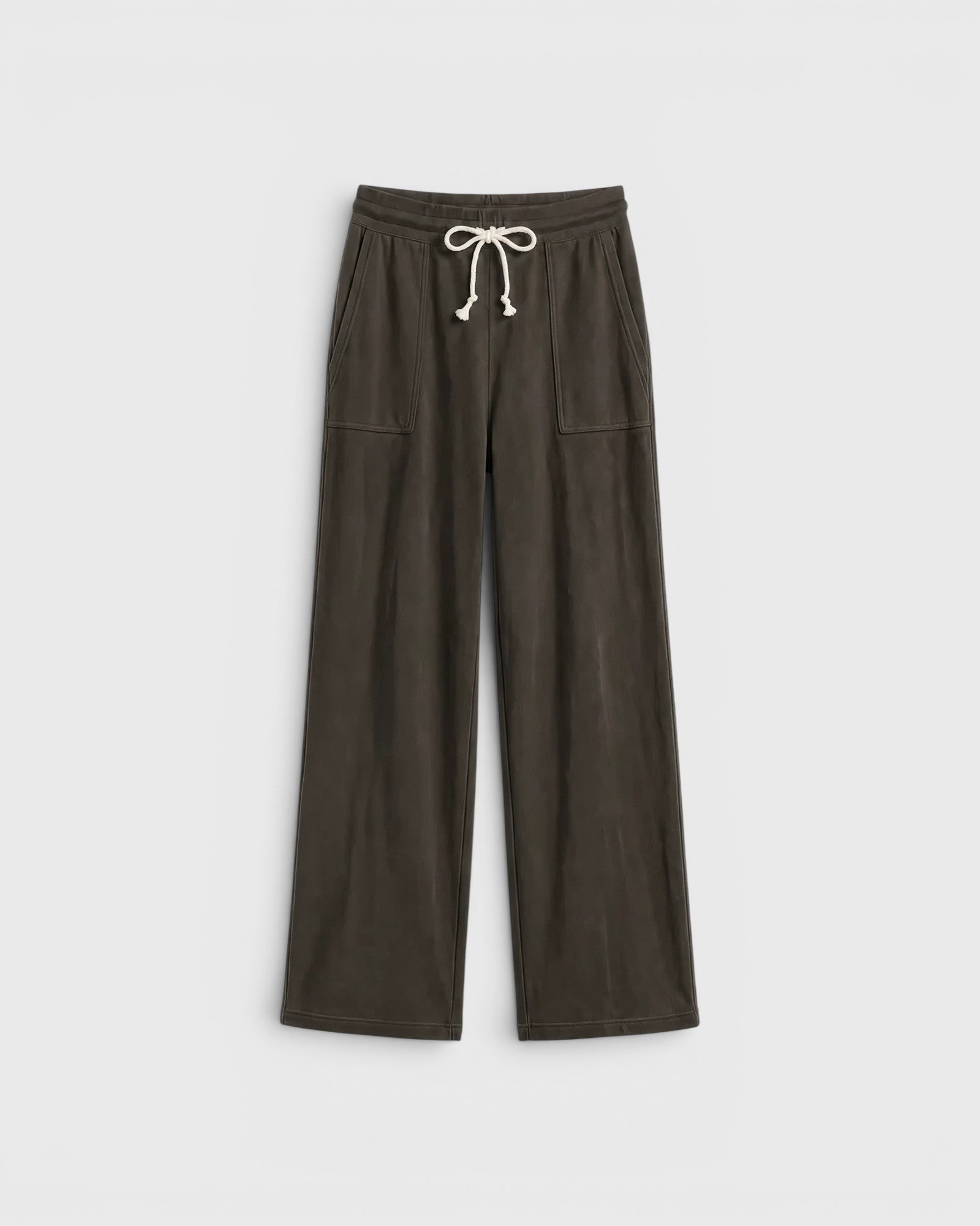 JONES + CO Noa straight-leg French terry pants in dark olive with a rope drawstring waist and deep side pockets.