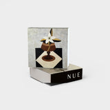 JONES + CO Nue matchbox featuring artistic floral illustration on a checkered surface with 100 matches included