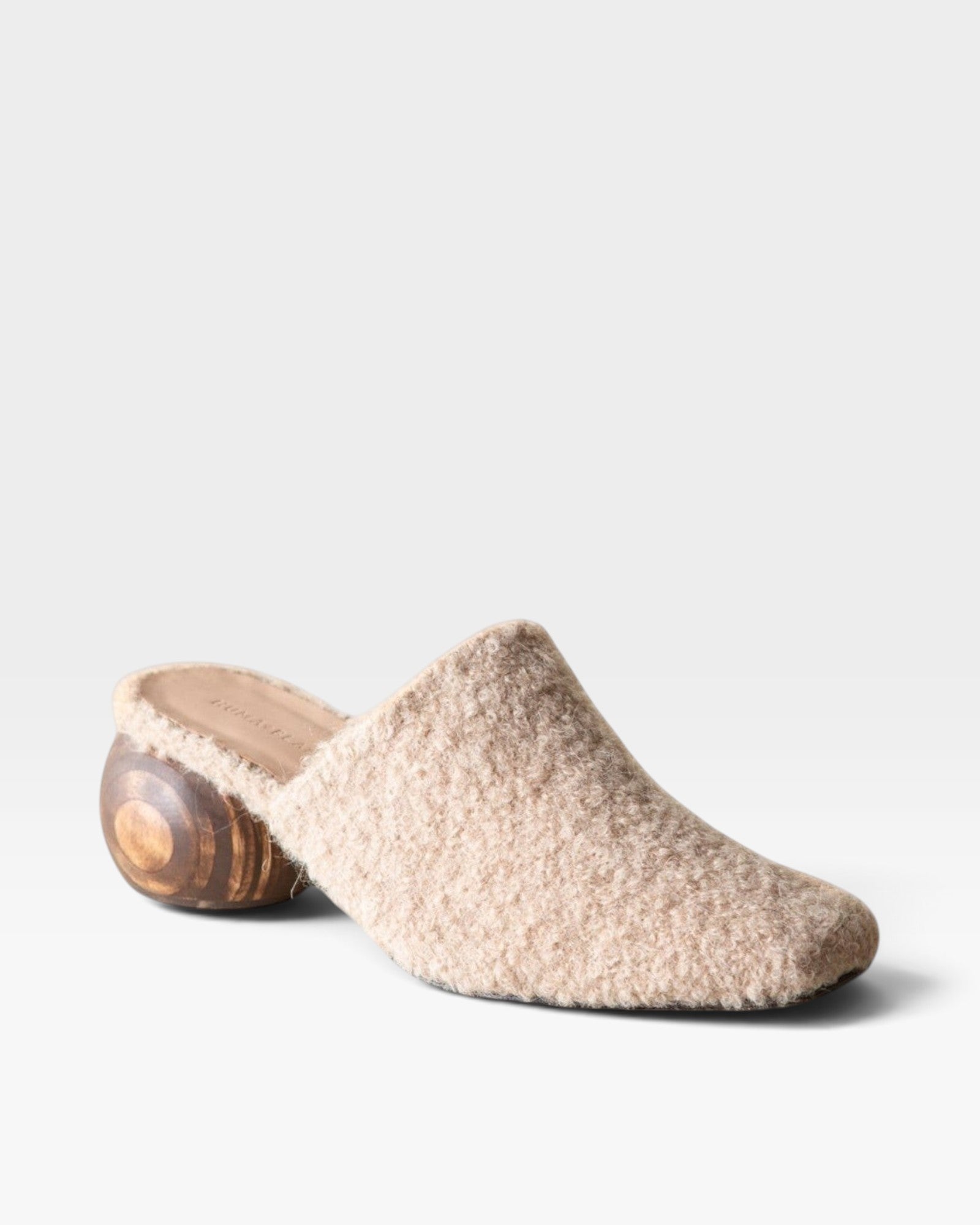 JONES + CO Mina mule in oatmeal alpaca wool with a unique sculpted round wooden heel and slip-on design.