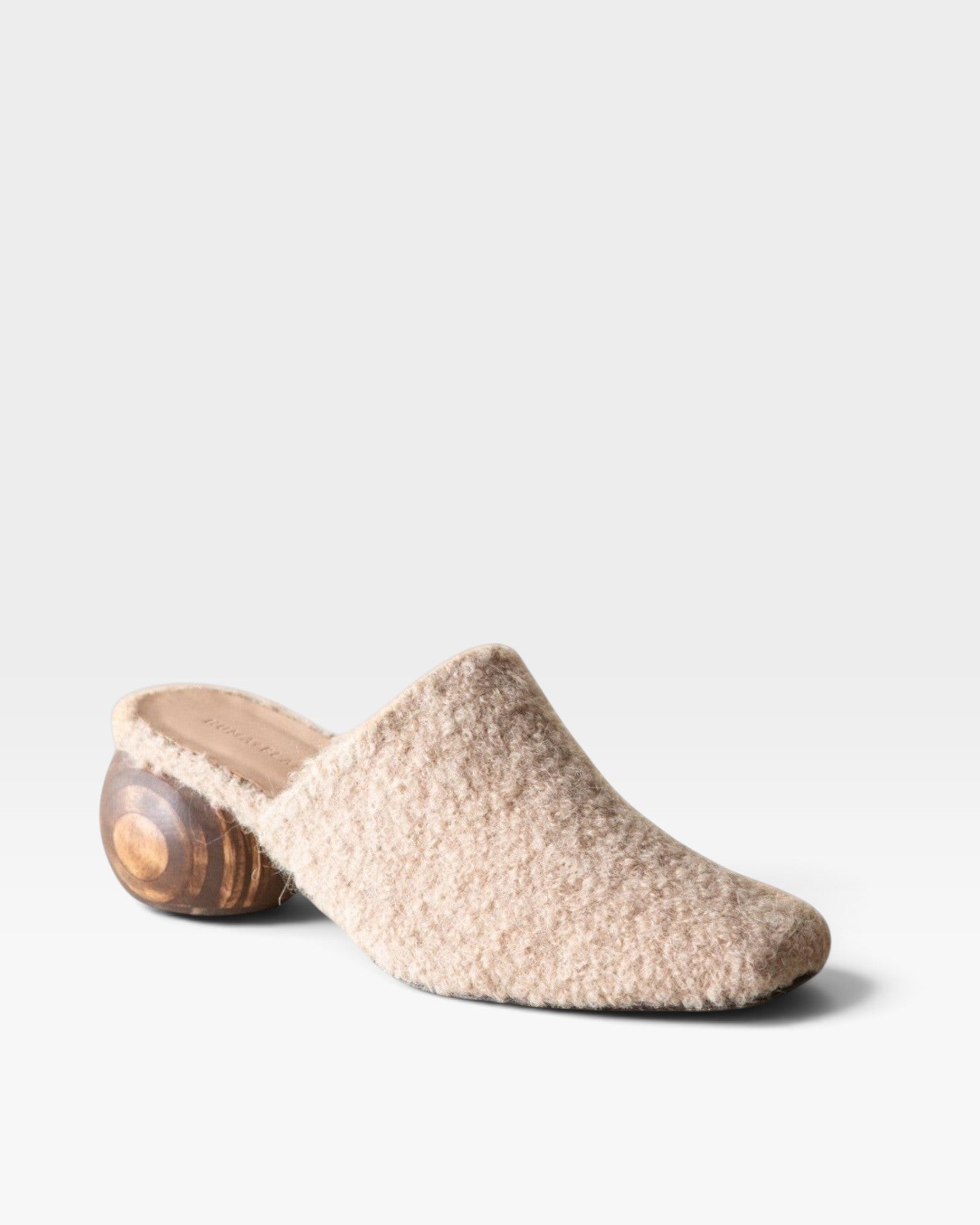 JONES + CO Mina mule in oatmeal alpaca wool with a unique sculpted round wooden heel and slip-on design.
