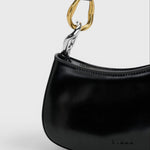 JONES + CO Ollie Bag in black polished leather with a unique two-tone gold and silver hardware strap detail.