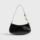 JONES + CO Ollie black polished leather shoulder bag with two-tone gold and silver hardware and zip closure.