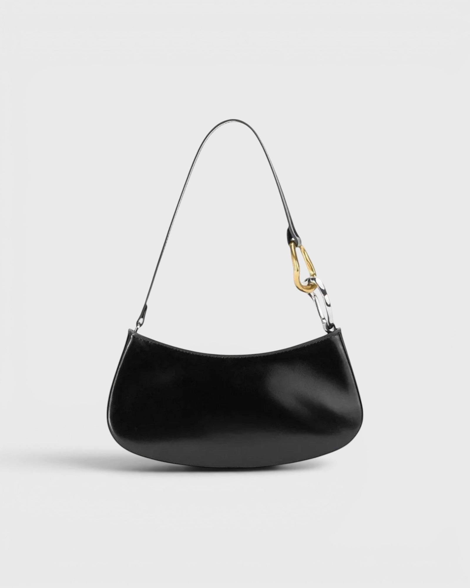 JONES + CO Ollie black polished leather shoulder bag with two-tone gold and silver hardware and zip closure.