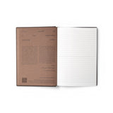JONES + CO Open Journal with dark brown cover, open to a lined page with introductory text and a QR code.
