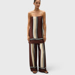 JONES + CO Phylis mini slip dress in Sintra stripe viscose satin with adjustable straps on a model