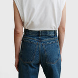 JONES + CO Puerto high-rise straight leg jeans in aged indigo cotton denim, back view on model
