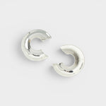 JONES + CO Rail chunky three-quarter carved hoop earrings in polished silver-plated brass.