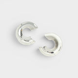 JONES + CO Rail chunky three-quarter carved hoop earrings in polished silver-plated brass.