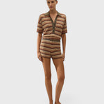 JONES + CO Raya high-rise knit mini shorts in a multi-color zig zag stripe pattern with a ribbed waistband.