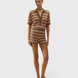 JONES + CO Raya high-rise knit mini shorts in a multi-color zig zag stripe pattern with a ribbed waistband.