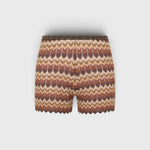 JONES + CO Raya high-rise knit mini shorts in a multi-color zig zag stripe pattern with a ribbed waistband.
