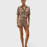 JONES + CO Raya polo top in Lais stripe crochet knit with collared neckline and button closure on a model