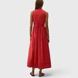 JONES + CO red cotton poplin midi dress with broderie lace trim and pintuck hem details, back view on a model.
