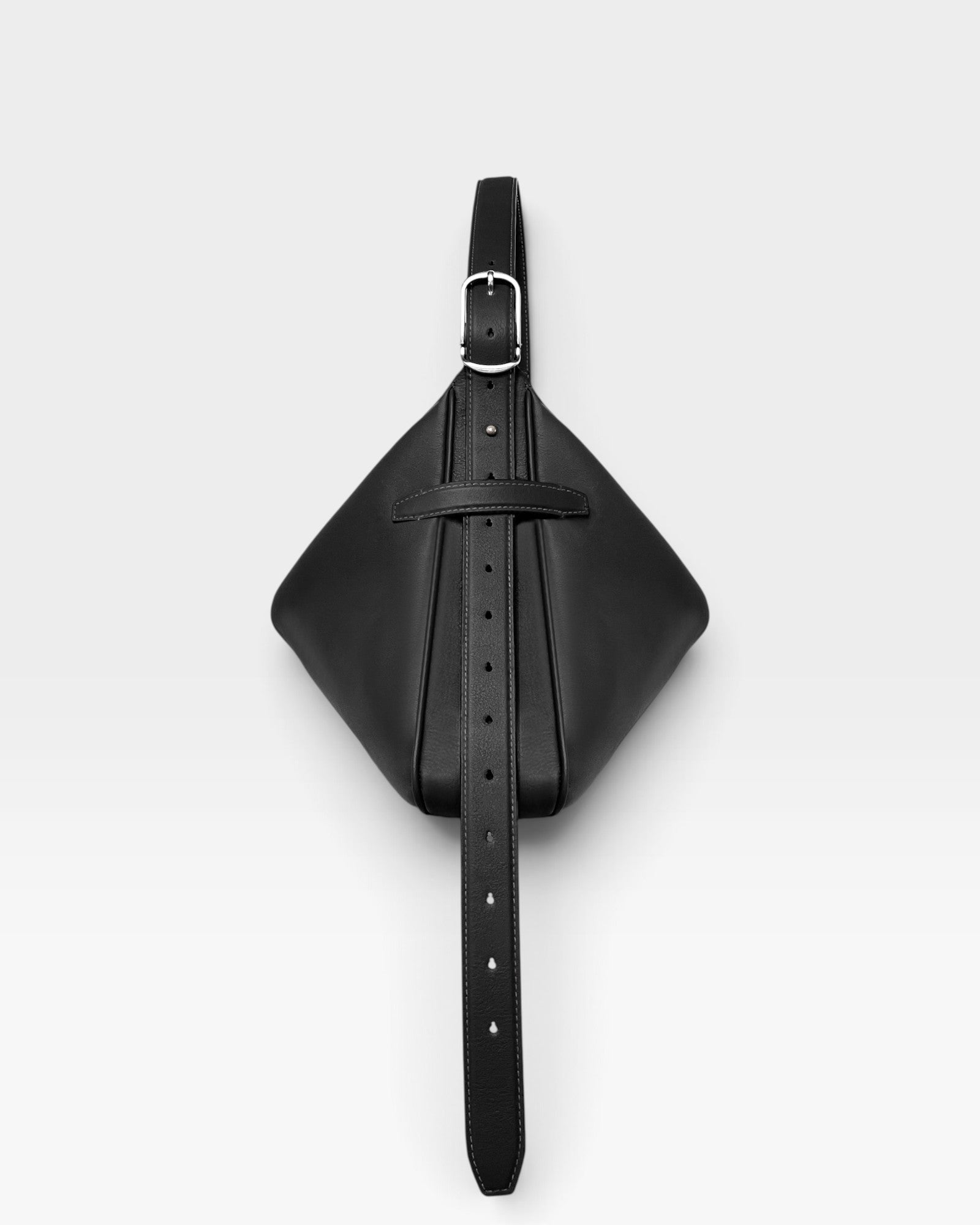 JONES + CO Rider M black soft calf leather bag with an adjustable belt-style strap and palladium brass hardware.