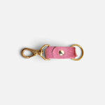 JONES + CO rose cowhide keychain with gold-tone metal clasp and ring on a light background
