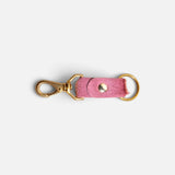 JONES + CO rose cowhide keychain with gold-tone metal clasp and ring on a light background