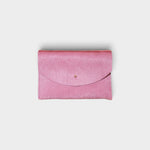 JONES + CO rose cowhide envelope pouch with a solid brass stud fastener, handmade in Portland.