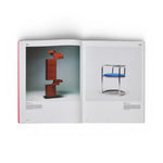 JONES + CO Shiro Kuramata monograph open to pages showing red geometric sculpture and blue and chrome chair designs.