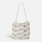 JONES + CO Mini Web Bag in silver featuring intricate leather macrame weaving and decorative bamboo beads.