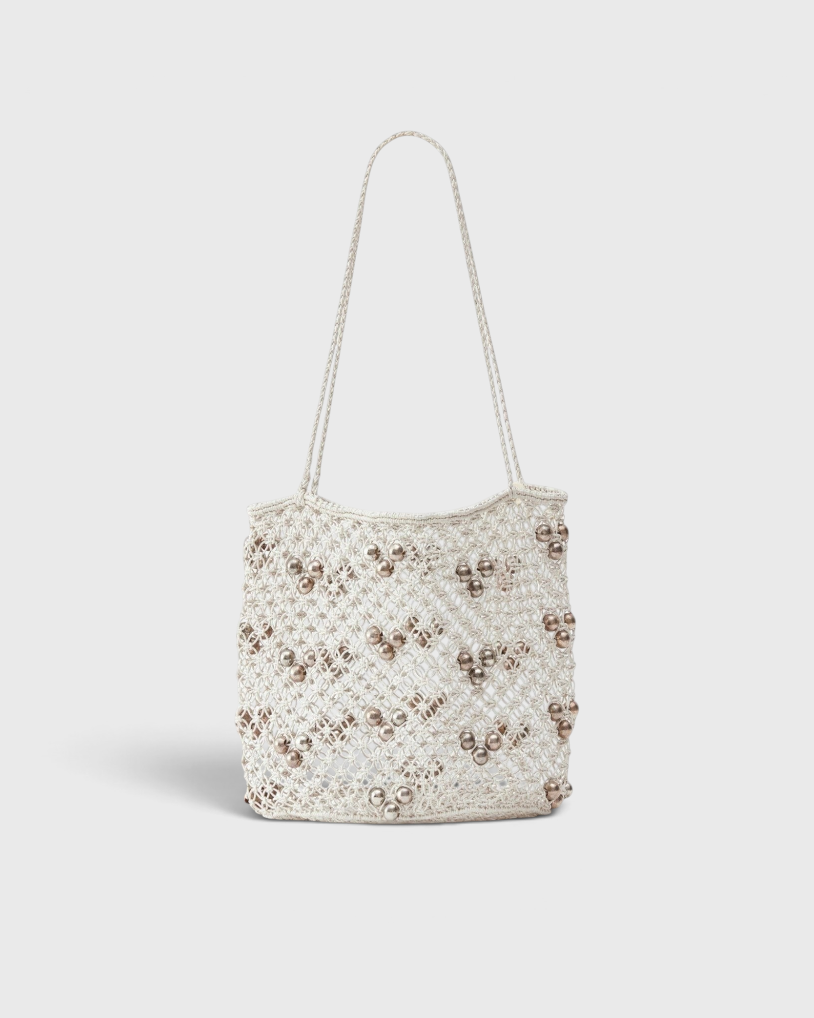 JONES + CO Mini Web Bag in silver featuring intricate leather macrame weaving and decorative bamboo beads.