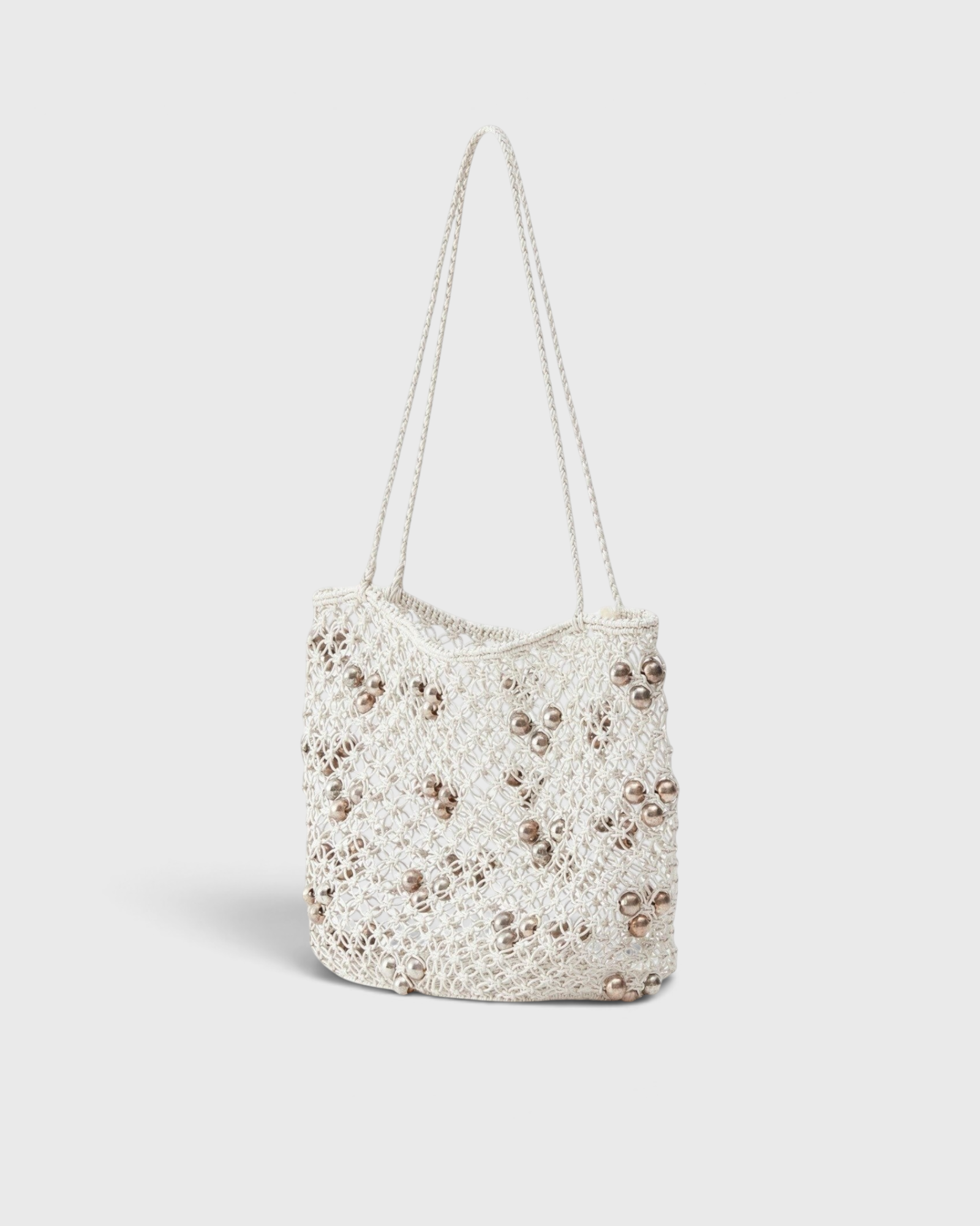JONES + CO Mini Web Bag in silver featuring intricate macrame leather weaving and decorative bamboo beads